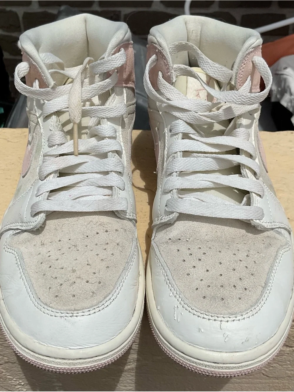 Nike Women’s White and Light Pink High-Top Sneakers